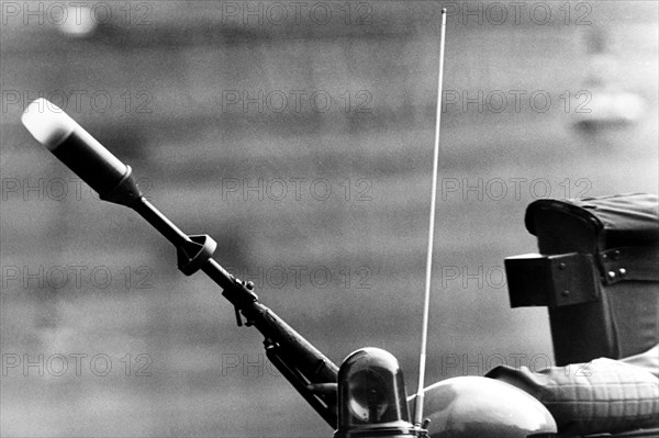 Police in riot gear, musket with tear gas, Italy 1978