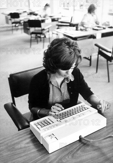 Employees work with computers, Italy 1981