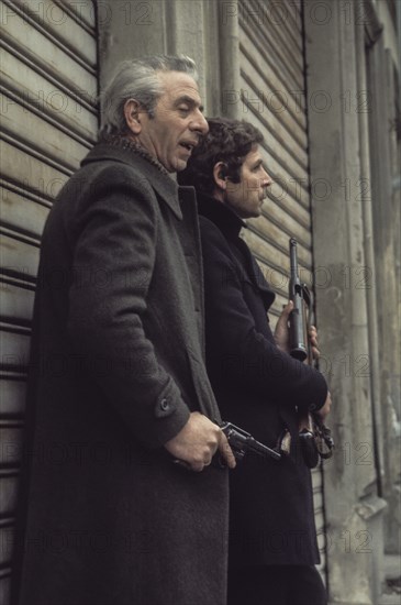 Policemen during a mugging, milan, 70's