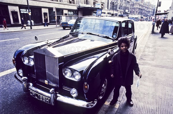 Uk, city of london, black children and rollroyce, 70's