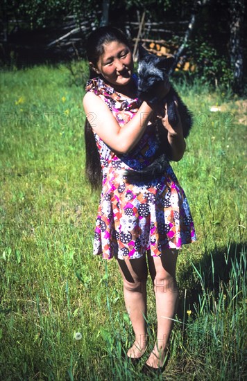 Ussr, siberia, jakutsk, jakutian girl with fox