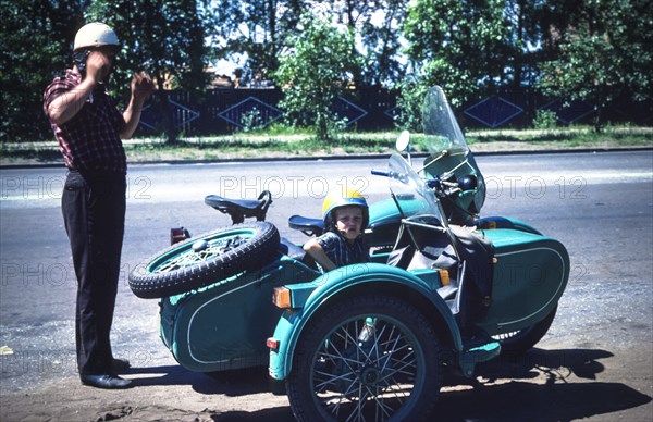 Ussr, siberia, irkutsk, father and son on sidecar