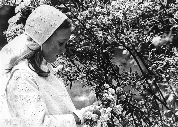 Girl in her first holy communion day, 60's