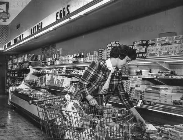 A woman in a usa market, 60's