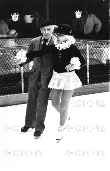 Elderly couple skating on ice, nyc, 80's