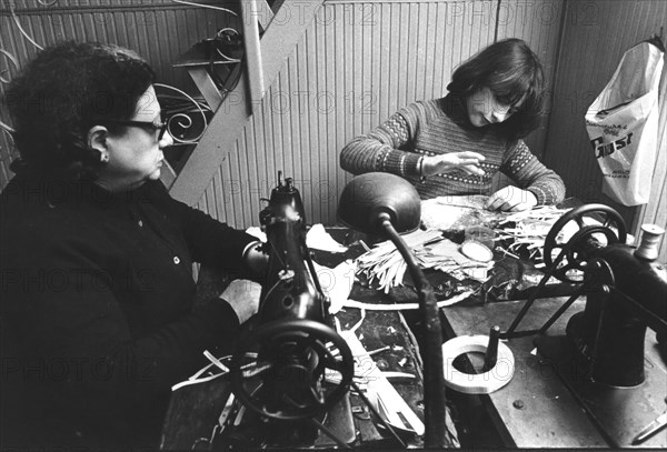 People working in a domestic shoes manufacturing, naples, italy, 70's