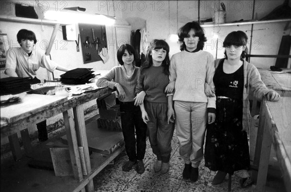 Young people working in a illegal manufacturing, naples, italy, 70's