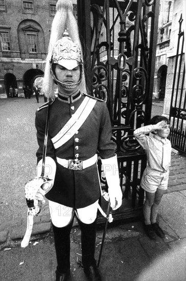 Children near a royal horse guard, london, uk, 70's