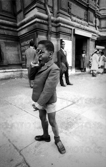 People in front of methodist church, london, 70's