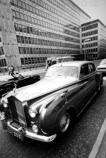 Rolls royce in a street of london, 70's