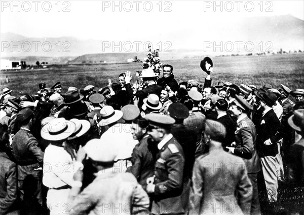 Ferrarin and Del Prete are carried in triumph by the crowd after completing his world record of   duration, Rome 1928