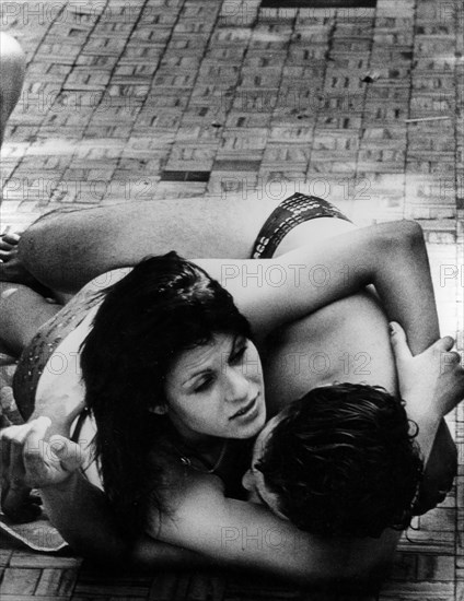 Couple at lido, milan, 70s