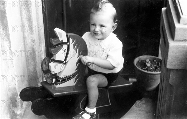 Child on rocking horse