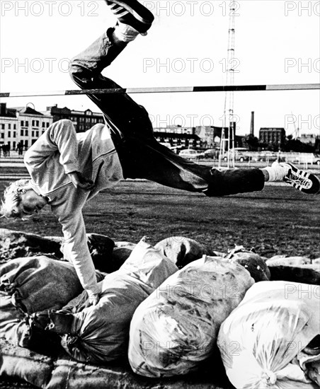 Athletics, workout, an athlete's high jump on the bags, 19