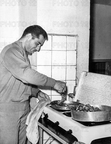 Cycling, cyclist Sante Gilardoni and kitchen, 1960