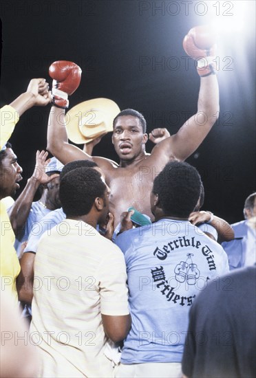 Larry Holmes wins against Witherspoon, the 80s