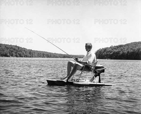 Man fishing, 70s