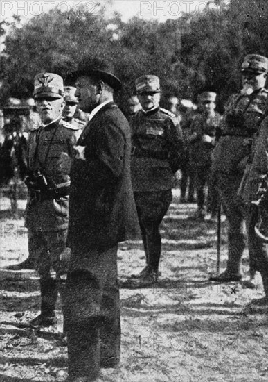 Mussolini and the king Vittorio Emanuele III of Savoy during a military maneuver, 20s