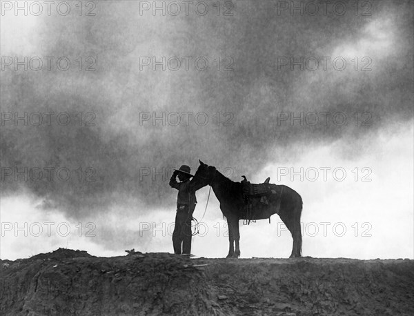 A Navajo And His Horse