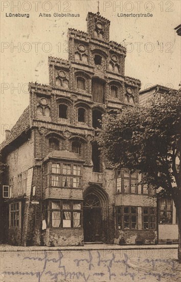 old gabled house in Lüneburg, Lower Saxony, Germany, view from ca 1910, digital reproduction of a public domain postcard.