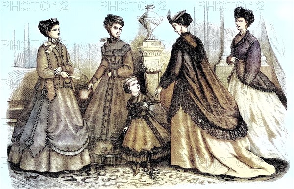 four women and two girls in current spring fashion