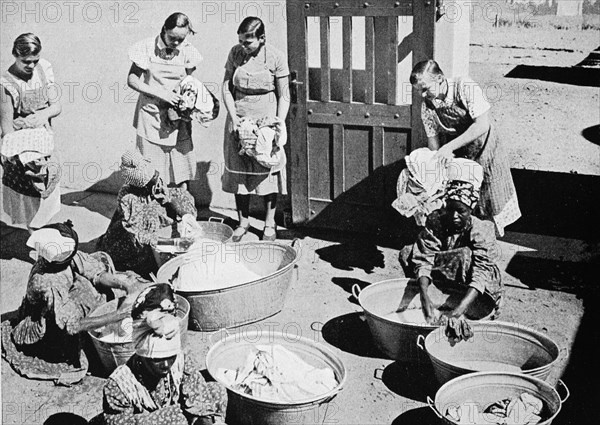 Housemaids doing the big wash on a German farm