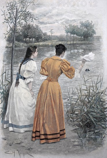 Two Women Are Waiting For Their Dog Swimming In The Lake