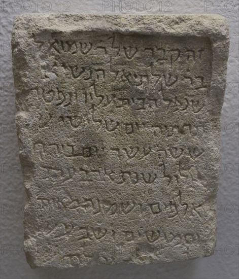 Funerary stele with Hebrew inscription.