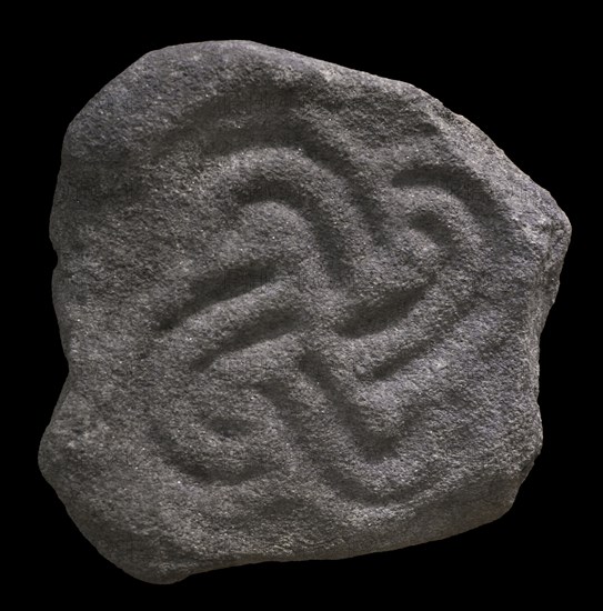 Architectural element depicting a tetraskelion.