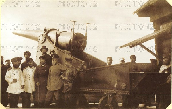 Mining chief of the Perm Cannon Plants Nikolai Gavrilovich Slavyanov in a group of plant engineers and artillery acceptance officers at the factory range