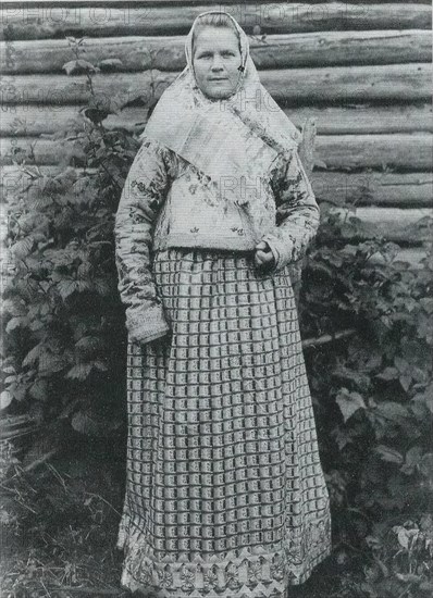 Russian woman in folk costume circa before 1917