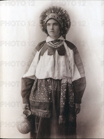 Young Russian woman in traditional cultural folk dress from South Russia