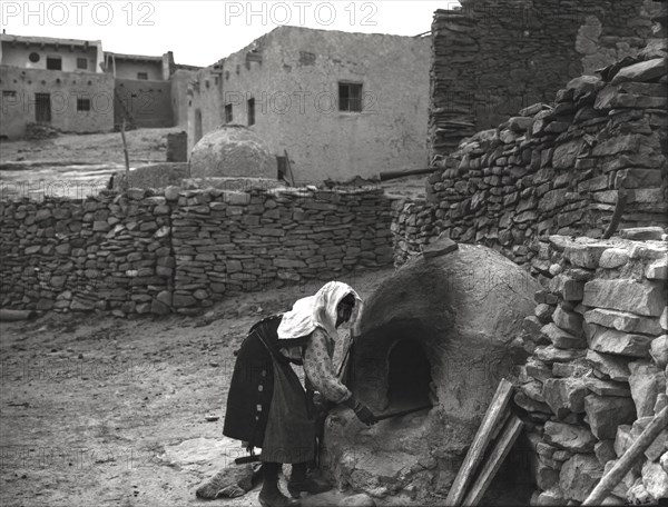 Laguna Woman Baking Bread