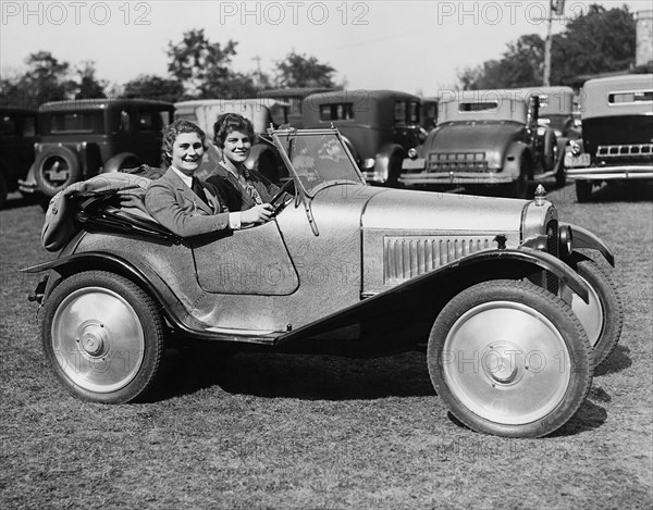 Women In An Austin Roadster