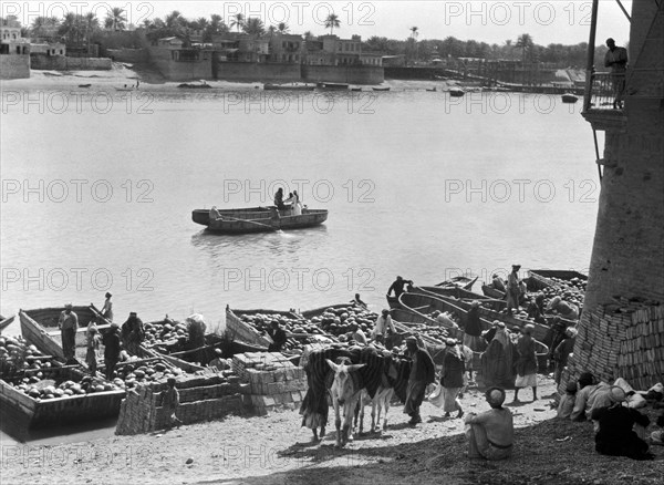 Unloading Boats On The Tigris