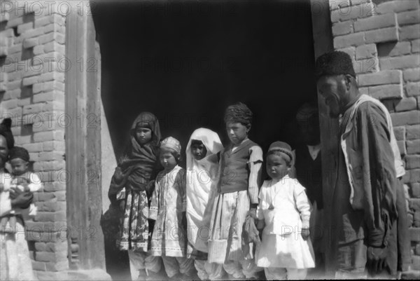 Children posing for a photograph.