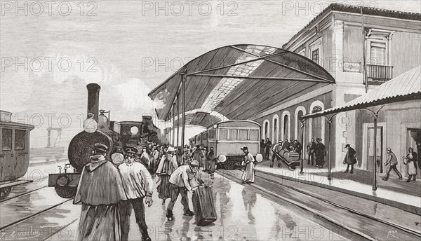 The arrival of a passenger train from Madrid at Cordoba station.