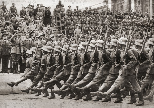 Troops of the 1st Division of the 8th German Army Corps marching into Vienna.