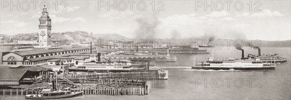 The ferry slips in front of the The San Francisco Ferry Building.