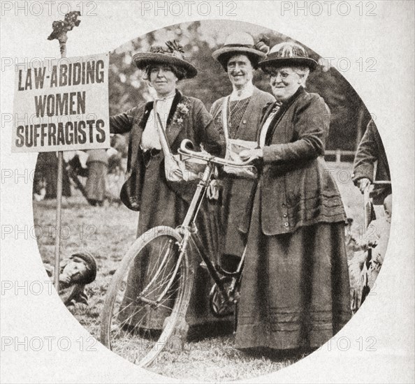 Three suffragettes at The Conquest of the Monument movement in London.