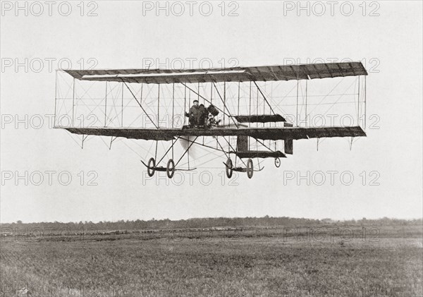 Henri Farman winning the Grand Prix of two thousand pounds for the longest flight of 112 miles in a Farman III Biplane.