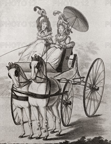 Two eighteenth century ladies in a carriage.