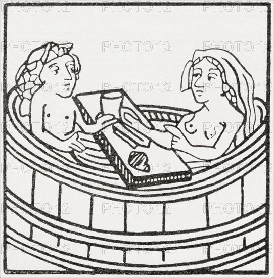 Man and woman together in a bathtub eating and bathing.