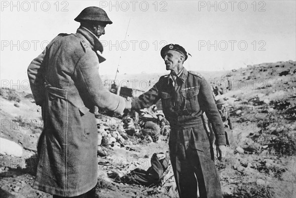 British and New Zealand cammanders meet at the first closing of the Robruk-Sidi rezegh corridor.