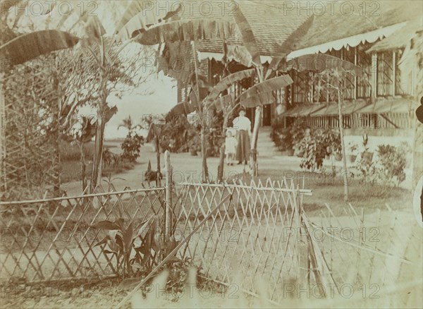 View of Marjory and Anne Wood standing in their garden