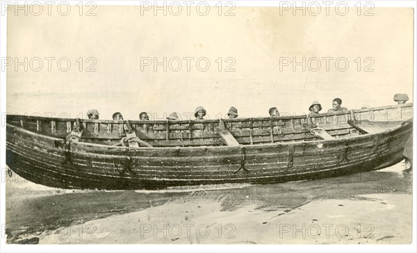 Wooden boat at water's edge