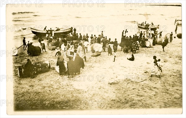 Rolling barrels on the beach