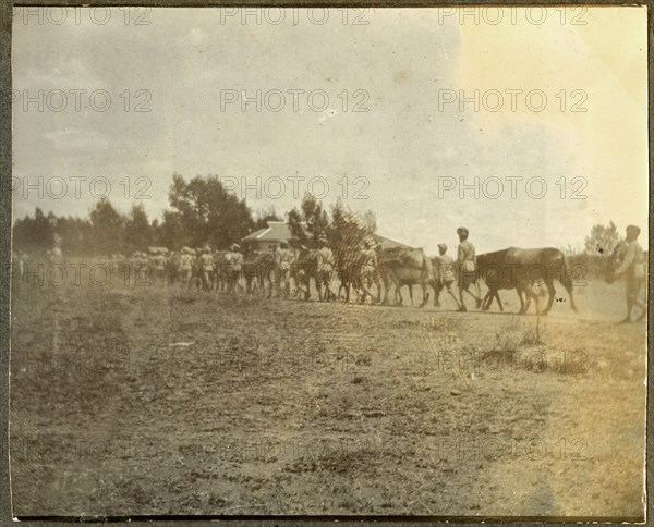 Charles Bungey with two men