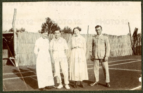 K.A.R. soldiers picking flowers