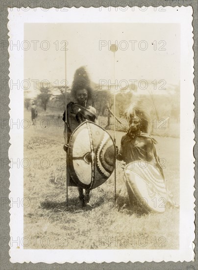 Nandi women grinding maize